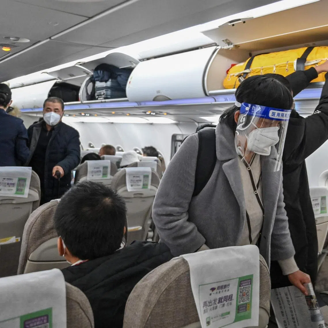 A passenger boards a domestic flight at Shanghai Pudong International Airport on Jan 3, 2023.