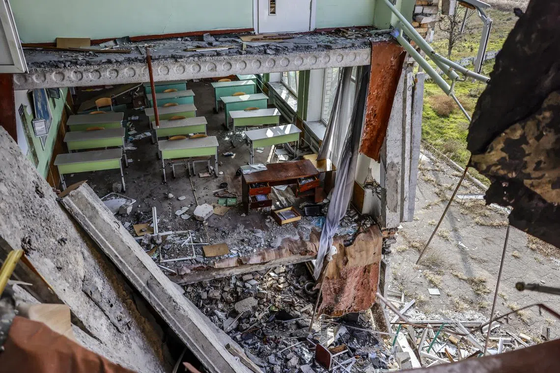 The damaged classroom of a school that is in close proximity to the frontline in the northern Kherson region of Ukraine. 