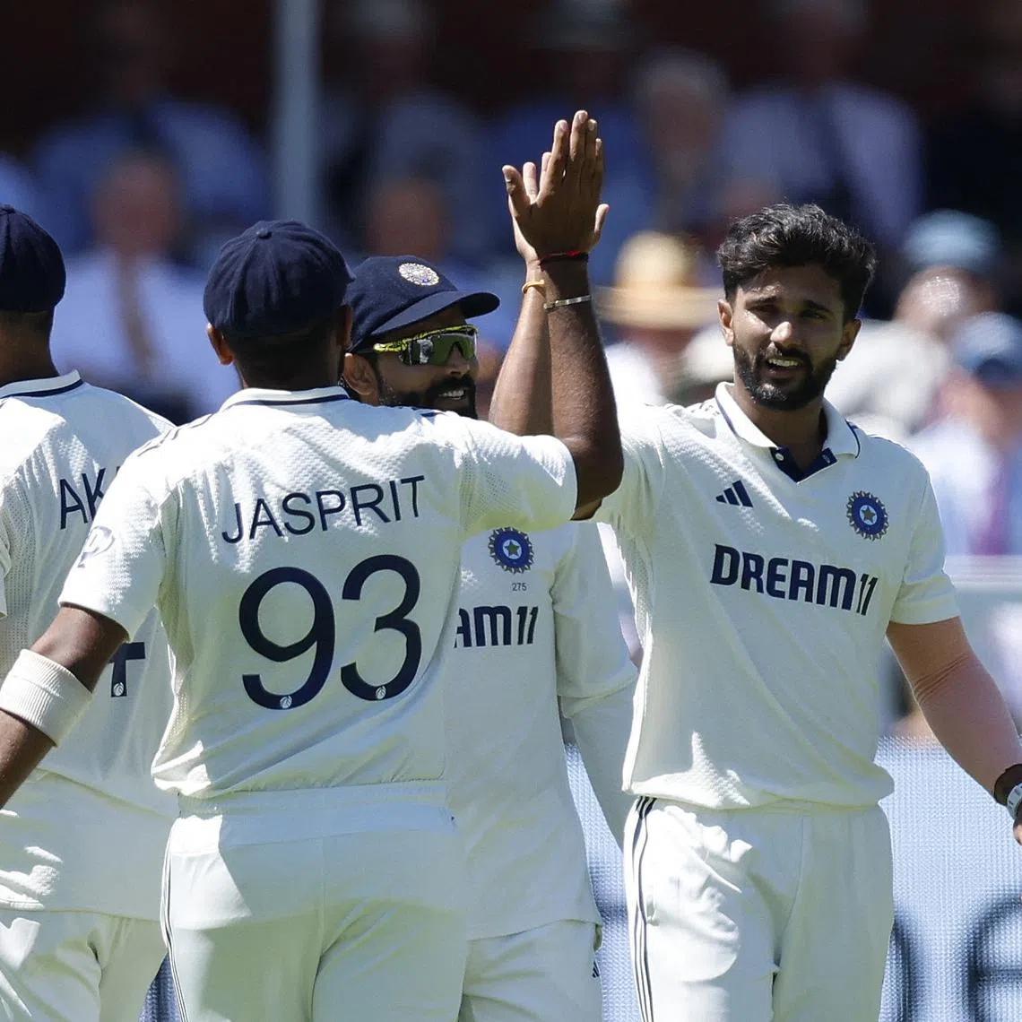 FILE PHOTO: Cricket - International Test Match Series - Third Test - England v India - Lord's Cricket Ground, London, Britain - July 10, 2025 India's Nitish Kumar Reddy celebrates with Jasprit Bumrah after the wicket of England's Zak Crawley Action Images via Reuters/Peter Cziborra/File Photo