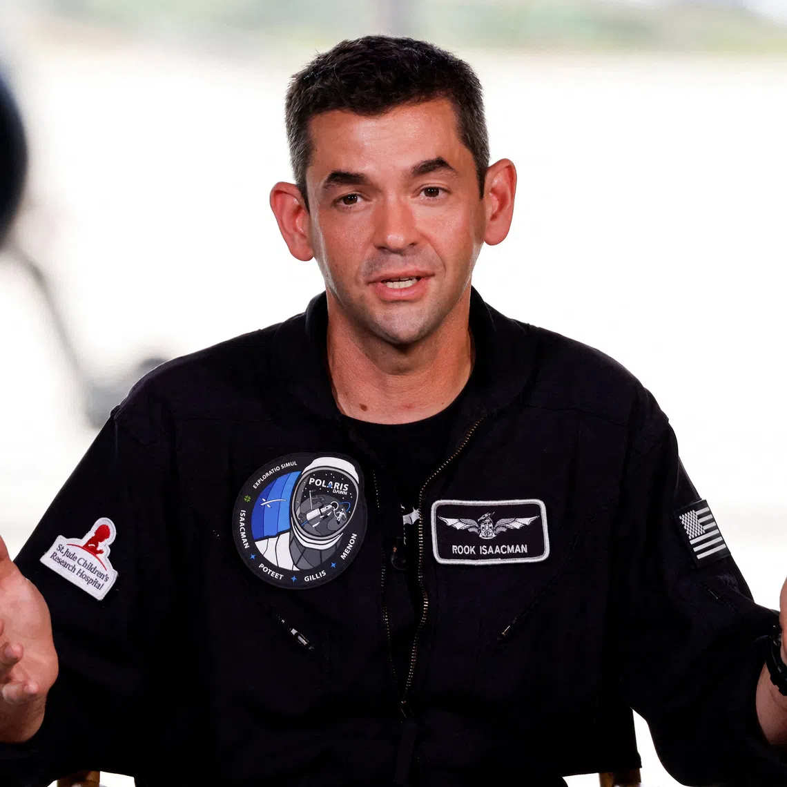 FILE PHOTO: Commander Jared Isaacman of Polaris Dawn, a private human spaceflight mission, speaks at a press conference at the Kennedy Space Center in Cape Canaveral, Florida, U.S. August 19, 2024. Launch aboard a SpaceX Falcon 9 rocket is scheduled for August 26. REUTERS/Joe Skipper/File Photo