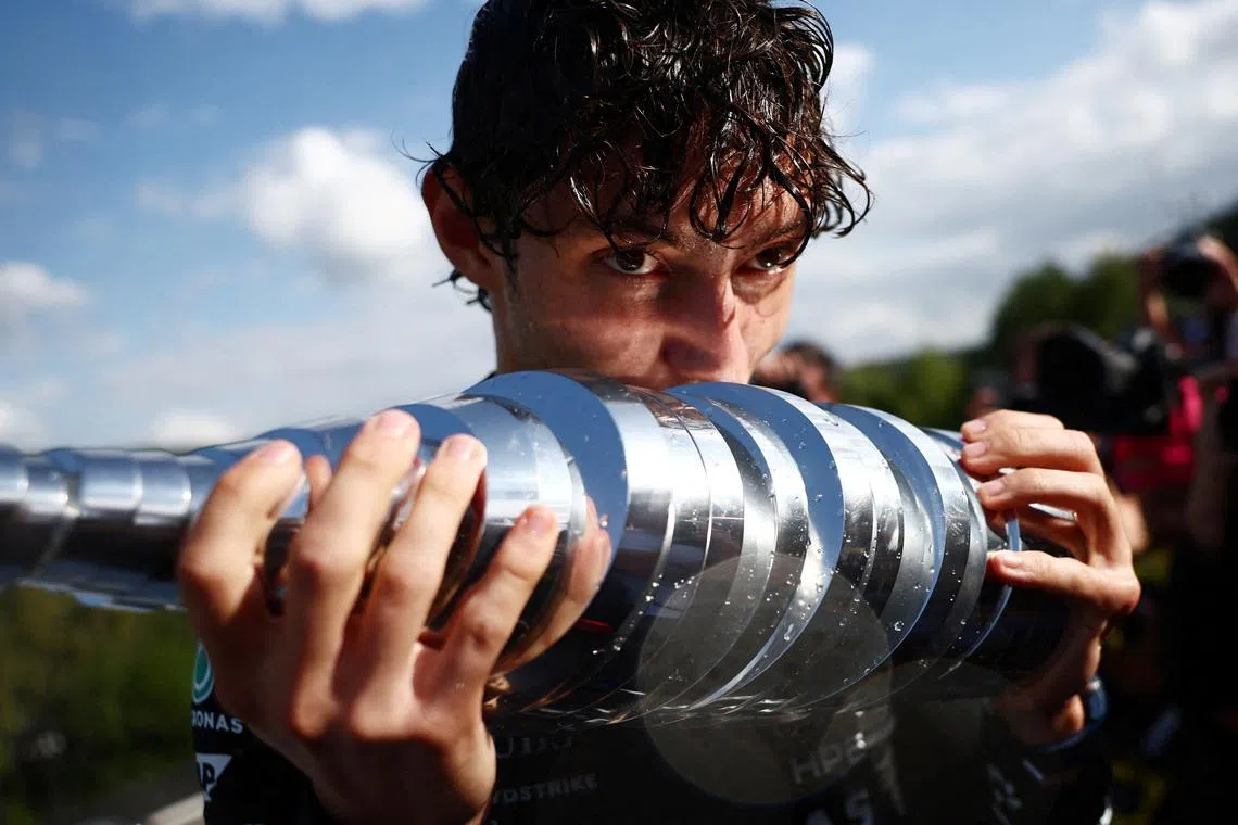 Formula One F1 - Belgian Grand Prix - Circuit de Spa-Francorchamps, Stavelot, Belgium - July 19, 2026 Mercedes' Andrea Kimi Antonelli kisses the trophy as he celebrates after winning the Belgian Grand Prix REUTERS/Jakub Porzycki