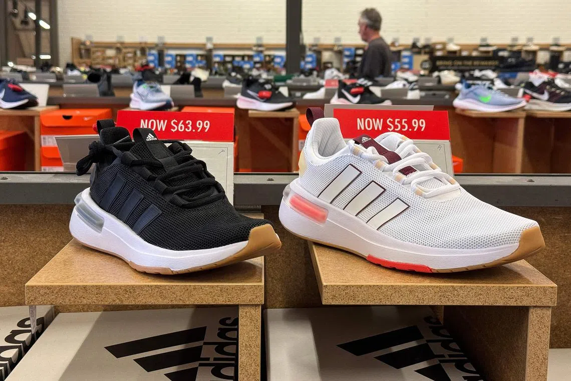 NOVATO, CALIFORNIA - JANUARY 31: Adidas shoes are displayed at a DSW store on January 31, 2024 in Novato, California. German sportswear maker Adidas reported a better-than-expected fourth quarter with an operating profit of 268 million euros in 2023 compared to an expected loss of $100 million after not writing off Yeezy inventory when they severed ties with rapper Ye, formerly known as Kanye West.   Justin Sullivan/Getty Images/AFP (Photo by JUSTIN SULLIVAN / GETTY IMAGES NORTH AMERICA / Getty Images via AFP)