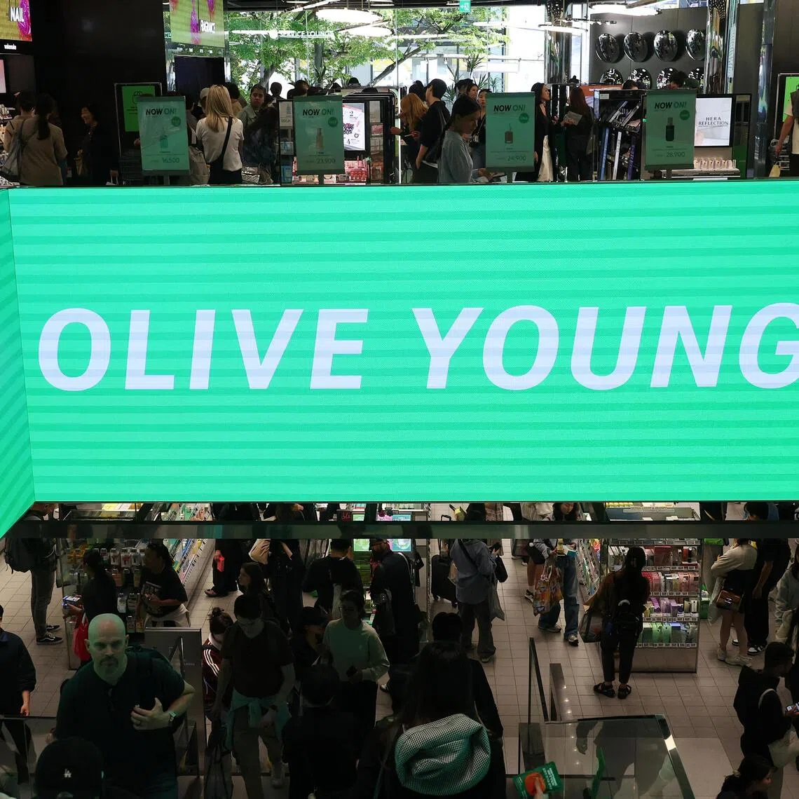 People shop at an Olive Young store in Seoul, South Korea, April 28, 2025. REUTERS/Kim Hong-Ji