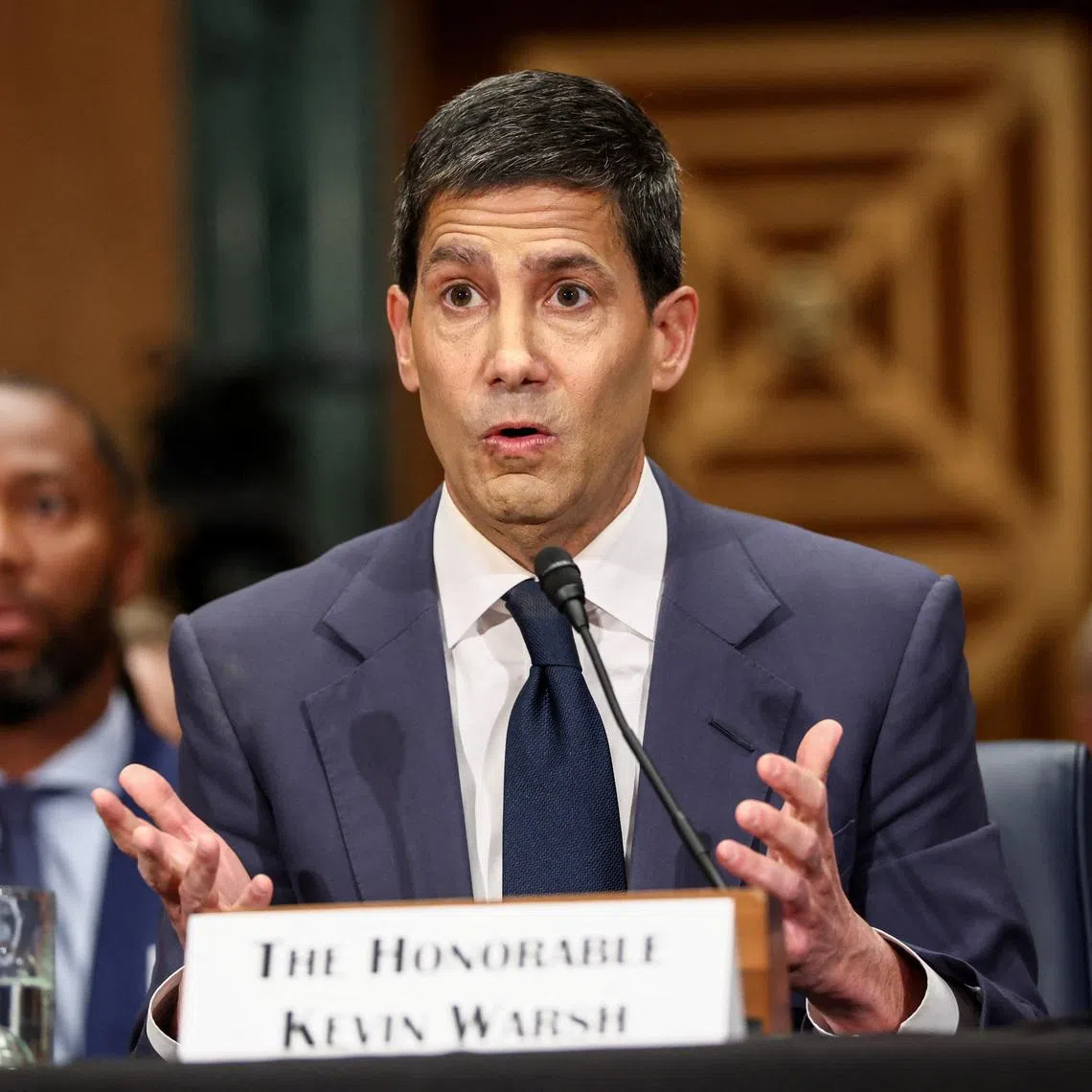 Kevin Warsh, U.S. President Donald Trump's nominee to be next chair of the Federal Reserve, testifies before a Senate Banking Committee confirmation hearing on Capitol Hill in Washington, D.C., U.S., April 21, 2026. REUTERS/Kevin Lamarque