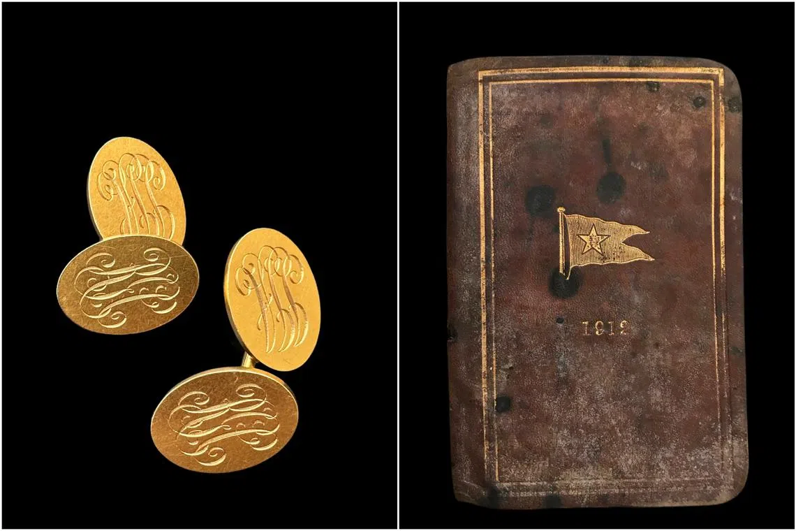 A set of cufflinks (left) and a pocketbook from among the items up for sale at an auction of Titanic memorabilia.