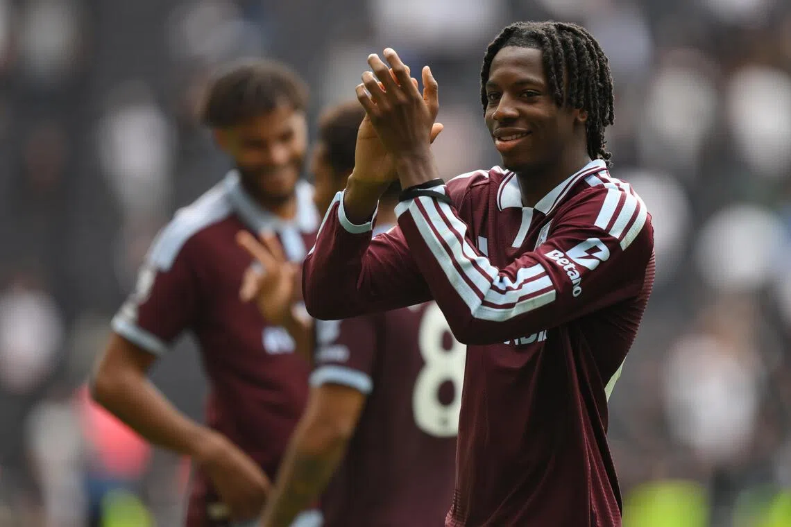 Aston Villa’s Johan Manzambi applauds their fans at full time during the English Premier League match between Tottenham Hotspur and Aston Villa in London on Sept 19.