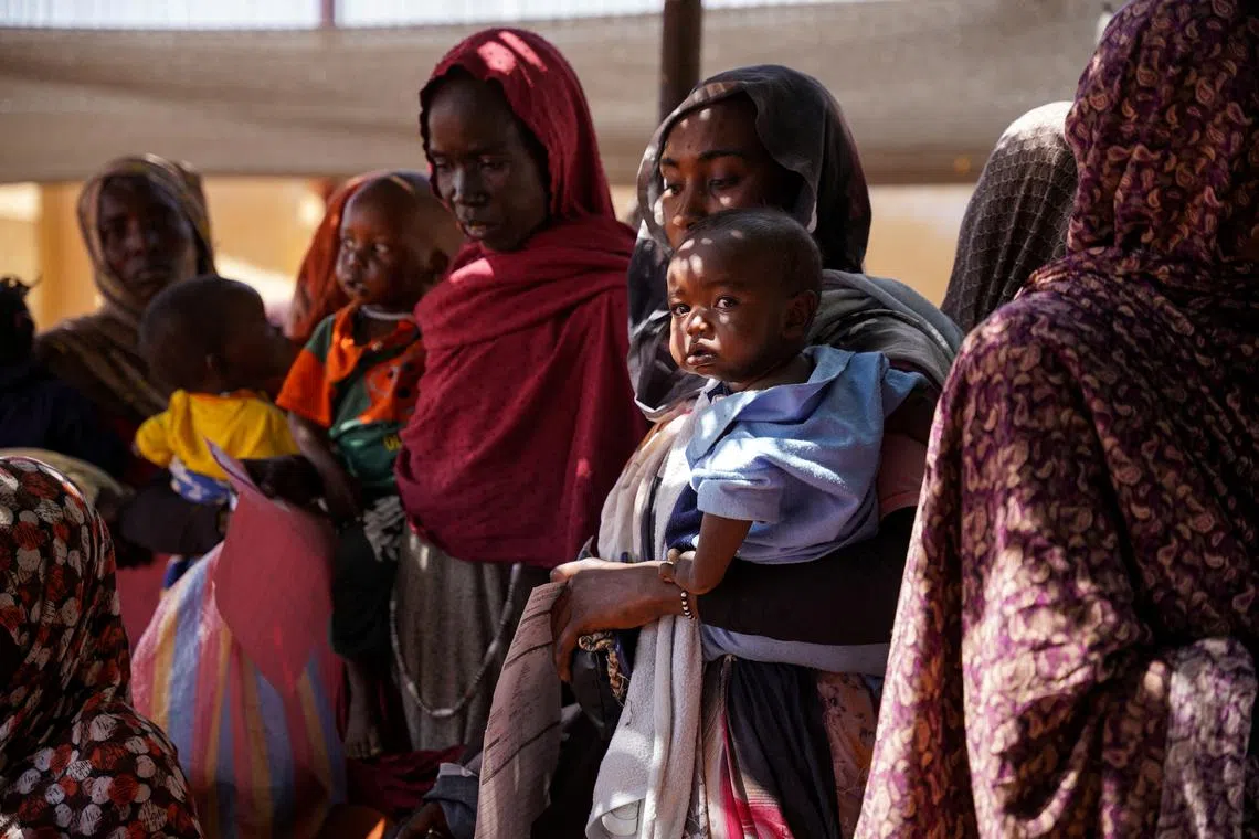 FILE PHOTO: A handout photograph, shot in January 2024, shows women and babies at the Zamzam displacement camp, close to El Fasher in North Darfur, Sudan. MSF/Mohamed Zakaria/Handout via REUTERS/File Photo