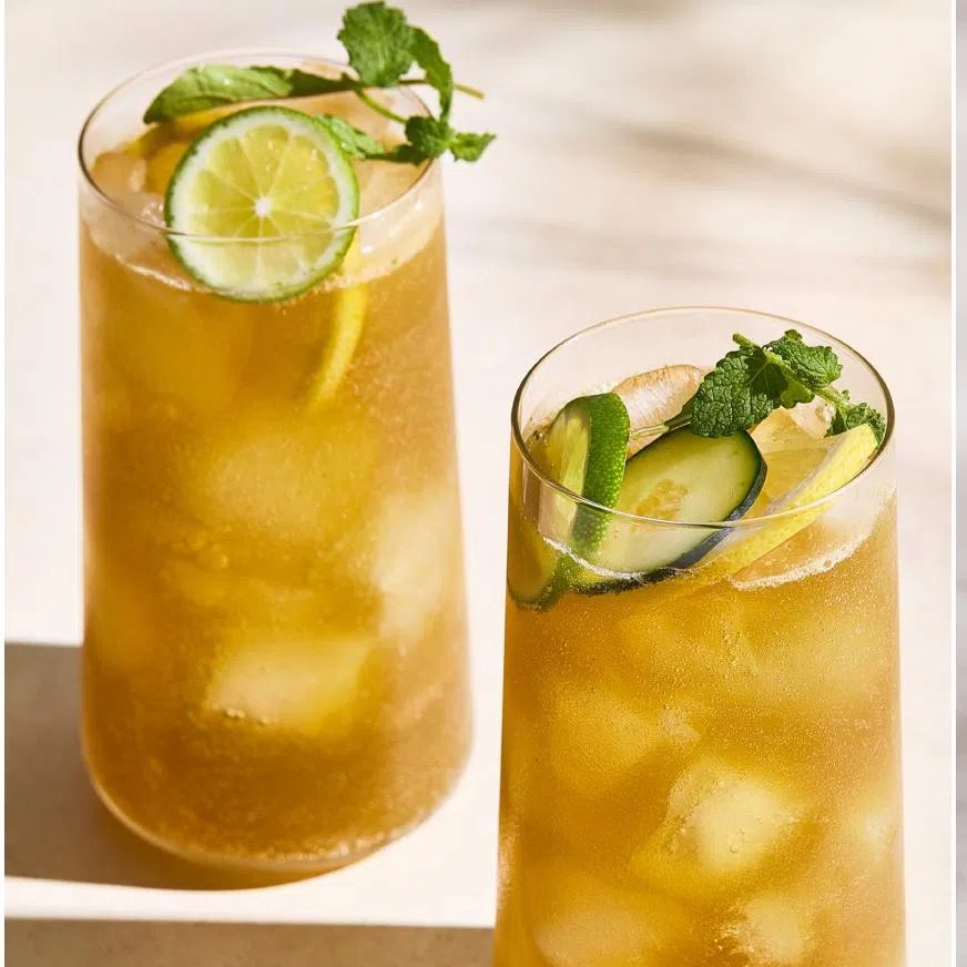 (From left) Arugula-mint Pimm’s Cup cocktail, Snap Pea Gimlet.