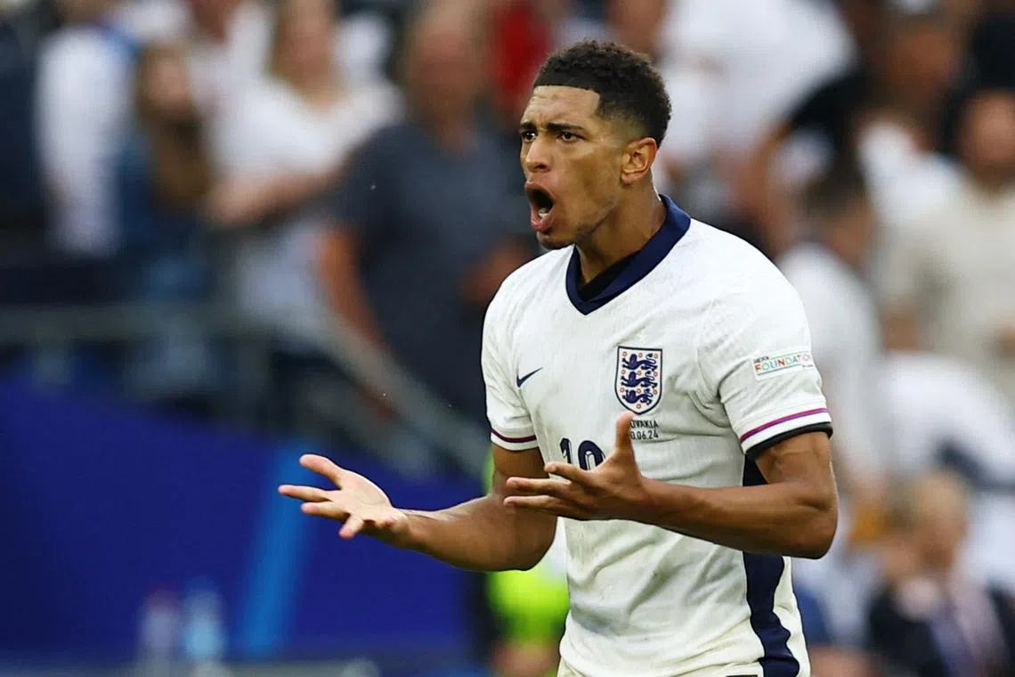 FILE PHOTO: Soccer Football - Euro 2024 - Round of 16 - England v Slovakia - Arena AufSchalke, Gelsenkirchen, Germany - June 30, 2024 England's Jude Bellingham celebrates scoring their first goal REUTERS/Lee Smith/ File Photo
