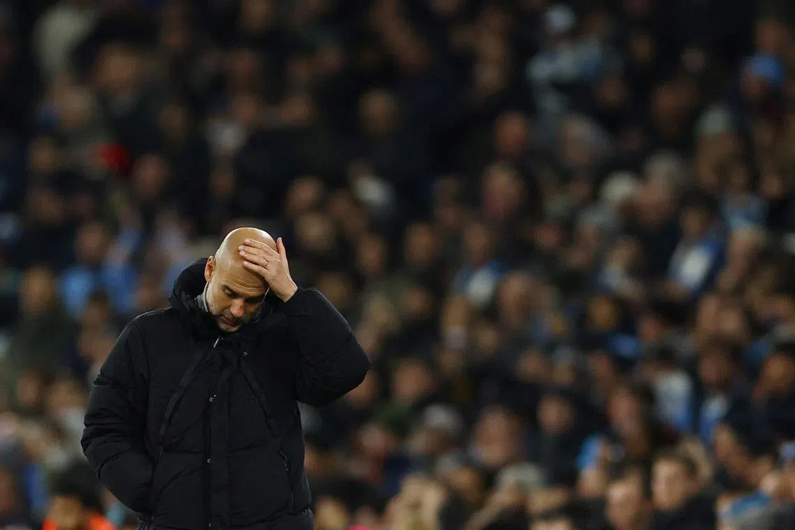 Manchester City manager Pep Guardiola looking distraught during the 3-3 Champions League draw with Feyenoord.
