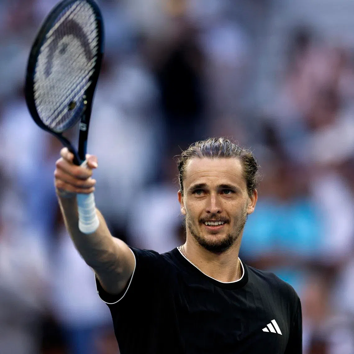 Tennis - Australian Open - Melbourne Park, Melbourne, Australia - January 25, 2026 Germany's Alexander Zverev celebrates after winning his fourth round match against Argentina's Francisco Cerundolo REUTERS/Tingshu Wang
