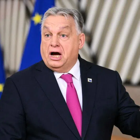  Hungary's Prime Minister Viktor Orban reacts as he arrives to attend the European Council meeting in Brussels on Dec 18, 2025.