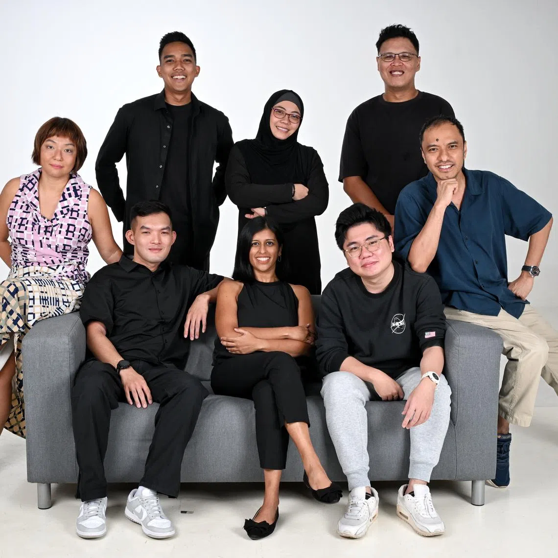 Seated (from left): Assistant podcast editor Lynda Hong, podcast producer Teo Tong Kai, The Usual Place podcast host Natasha Zachariah, podcast producer Eden Soh and podcast editor Ernest Luis. Standing (from left): Podcast producers Amirul Karim, Fa'izah Sani and Hadyu Rahim.