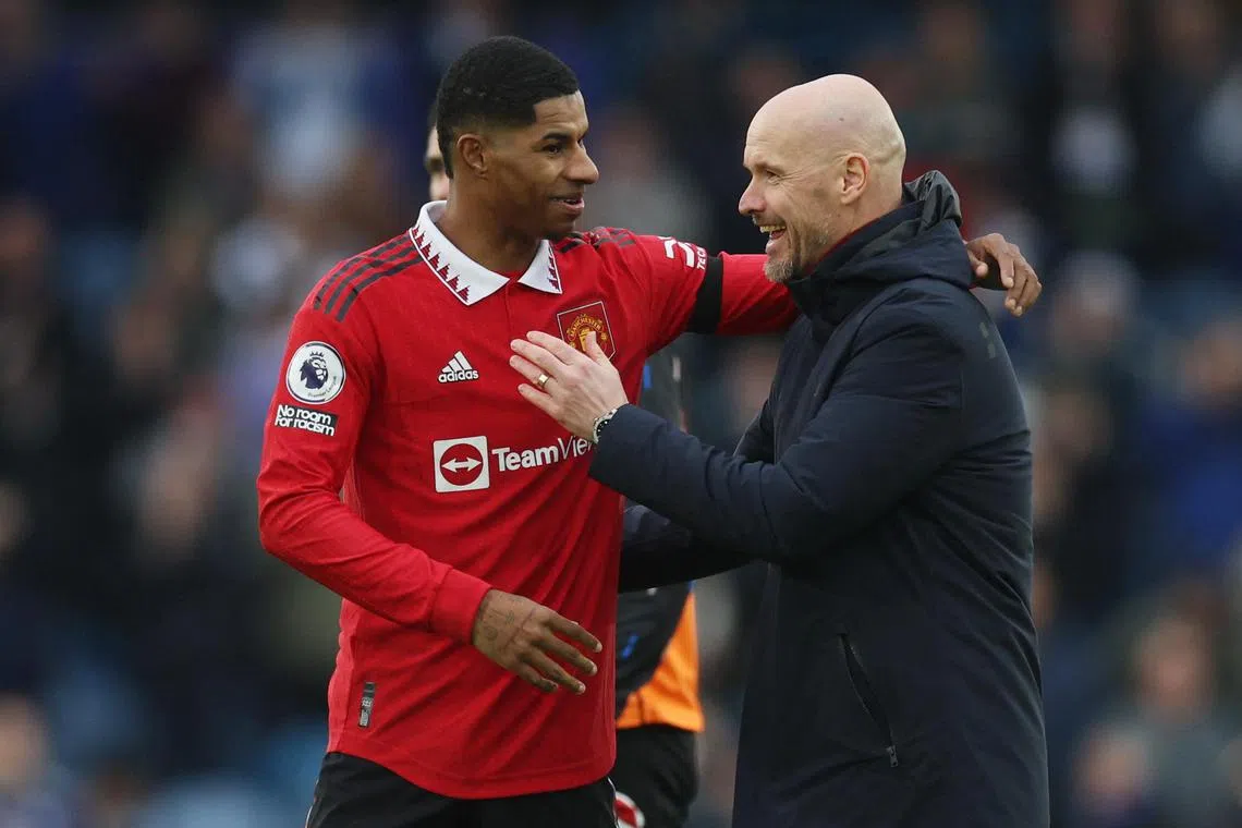 Manchester United striker Marcus Rashford and manager Erik ten Hag celebrating after the 2-0 English Premier League win over Leeds United at Elland Road.