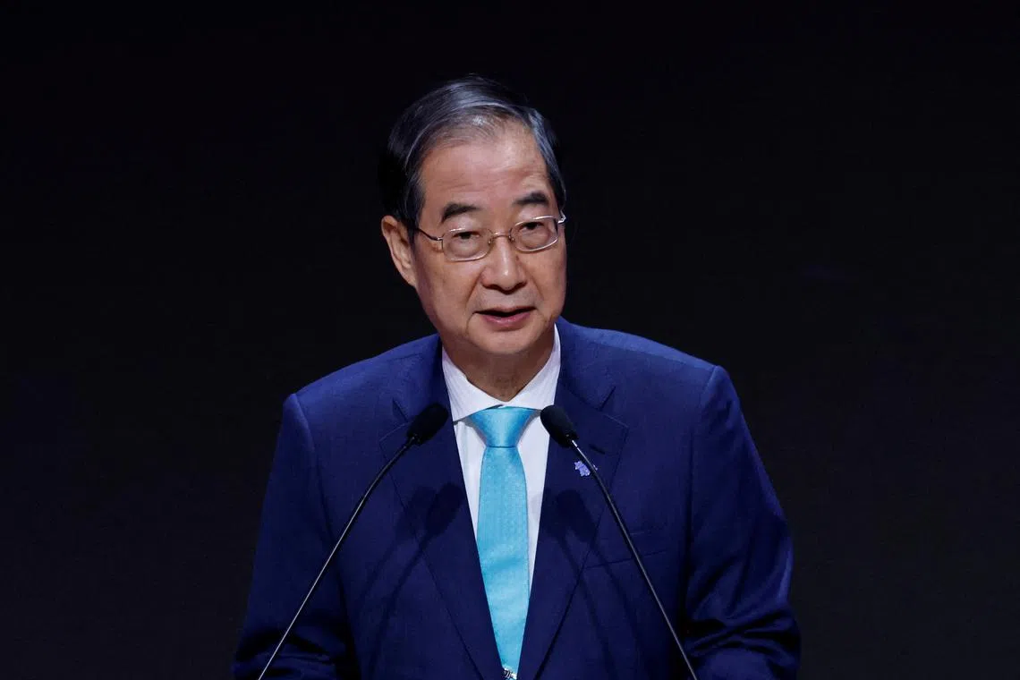 FILE PHOTO: Han Duck-soo, South Korean Prime Minister, gives a speech during the opening ceremony of the AI Global Forum in Seoul, South Korea, May 22, 2024. REUTERS/Kim Soo-hyeon/File photo