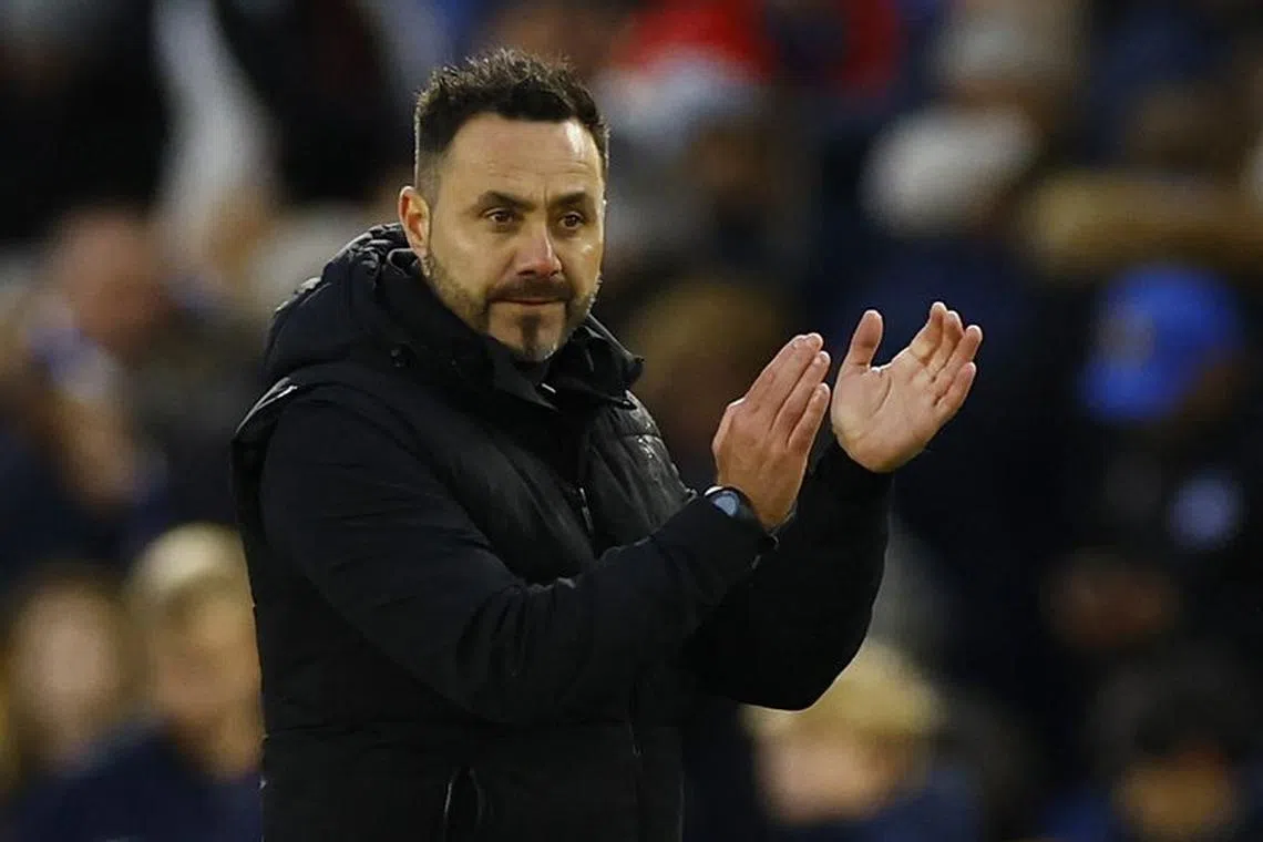 Soccer Football - Premier League - Brighton & Hove Albion v Sheffield United - The American Express Community Stadium, Brighton, Britain - November 12, 2023 Brighton & Hove Albion manager Roberto De Zerbi applauds fans after the match Action Images via Reuters/Peter Cziborra