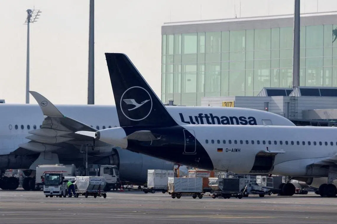 FILE PHOTO: Lufthansa's aircrafts are seen on the tarmac the day before VERDI union called airport workers at Frankfurt, Munich, Stuttgart, Hamburg, Dortmund, Hanover and Bremen airports to go on a 24-hour strike on Friday, at the Munich International Airport, Germany, February 16, 2023. REUTERS/Leonhard Simon///File Photo