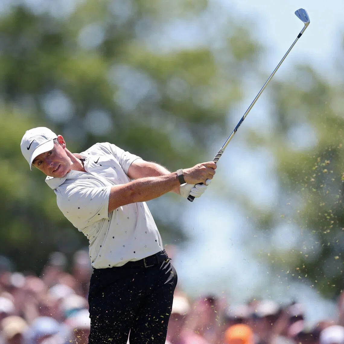 Rory McIlroy hitting an approach shot on the eighth hole during the third round of the PGA Championship on May 16.