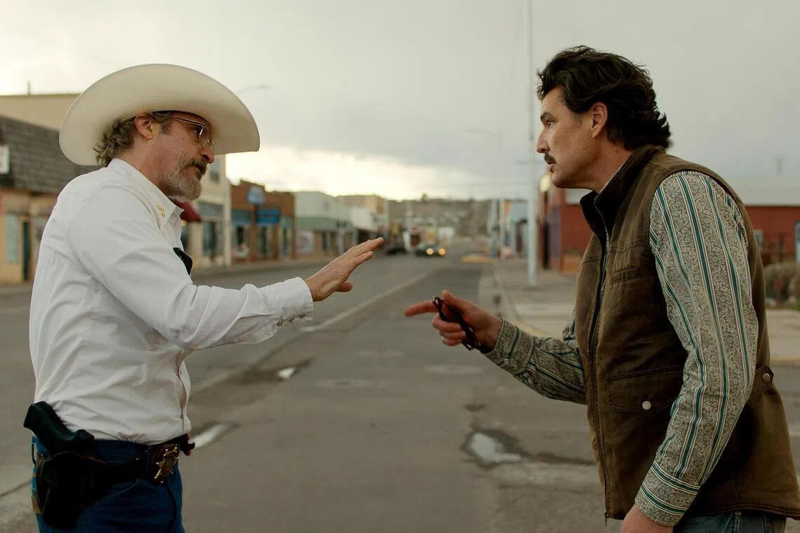 Joaquin Phoenix (left) and Pedro Pascal in Eddington.
