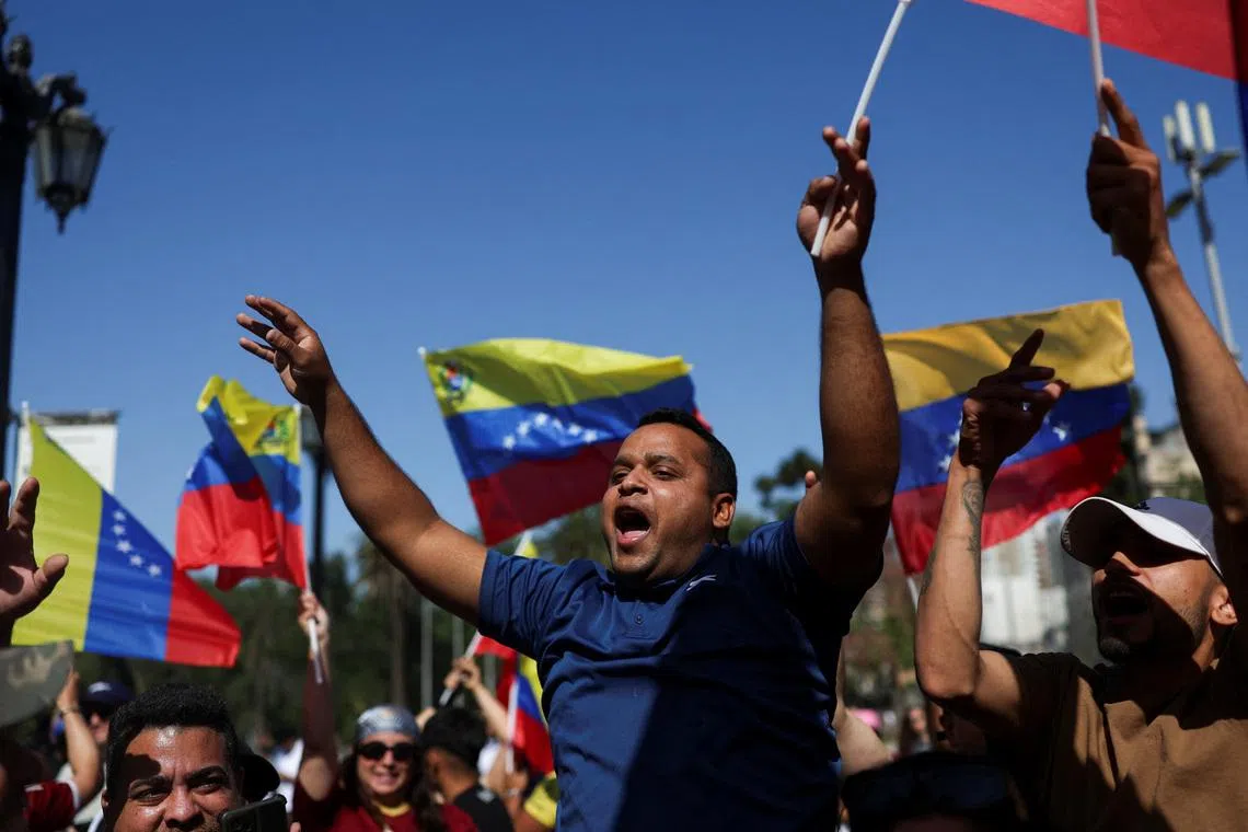 Venezuelans gather to celebrate in Santiago, Chile, on Jan 3.