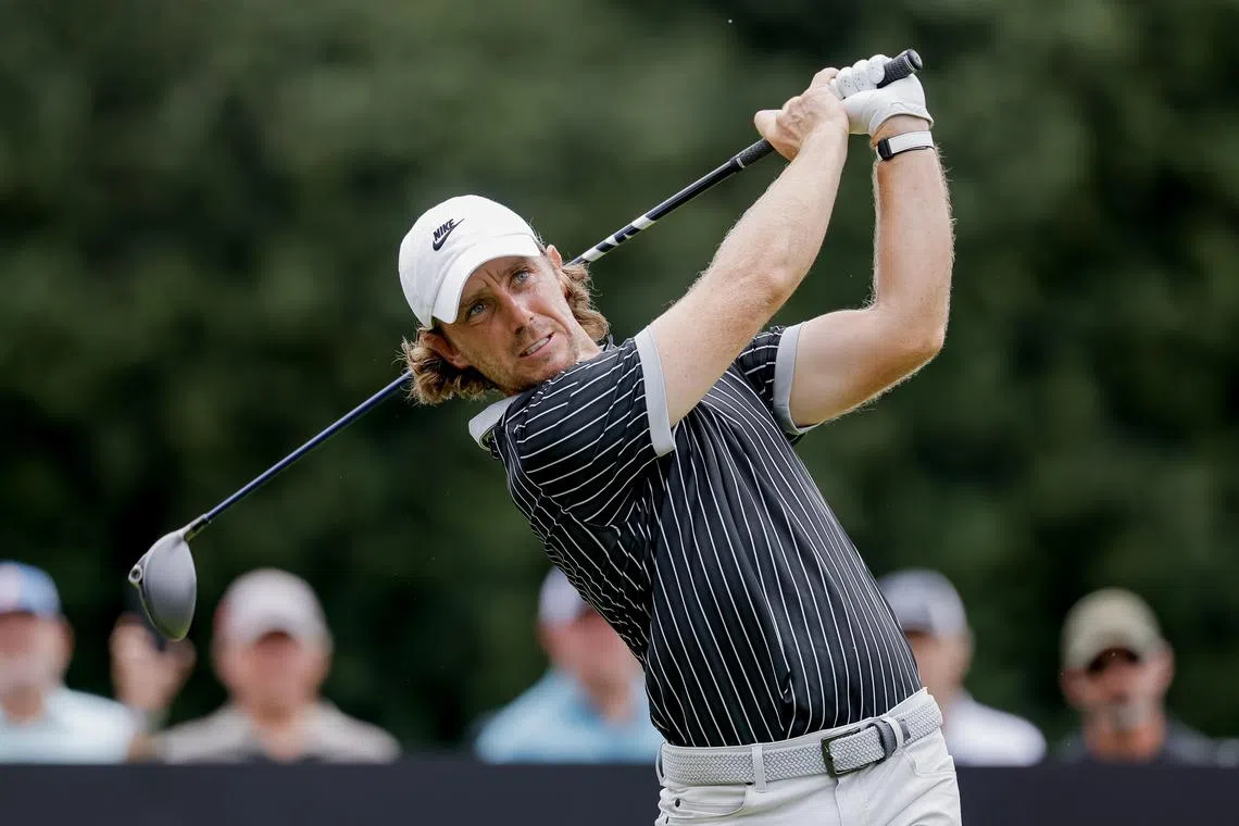 Tommy Fleetwood of England tees the 18th hole during the second round of the Tour Championship.
