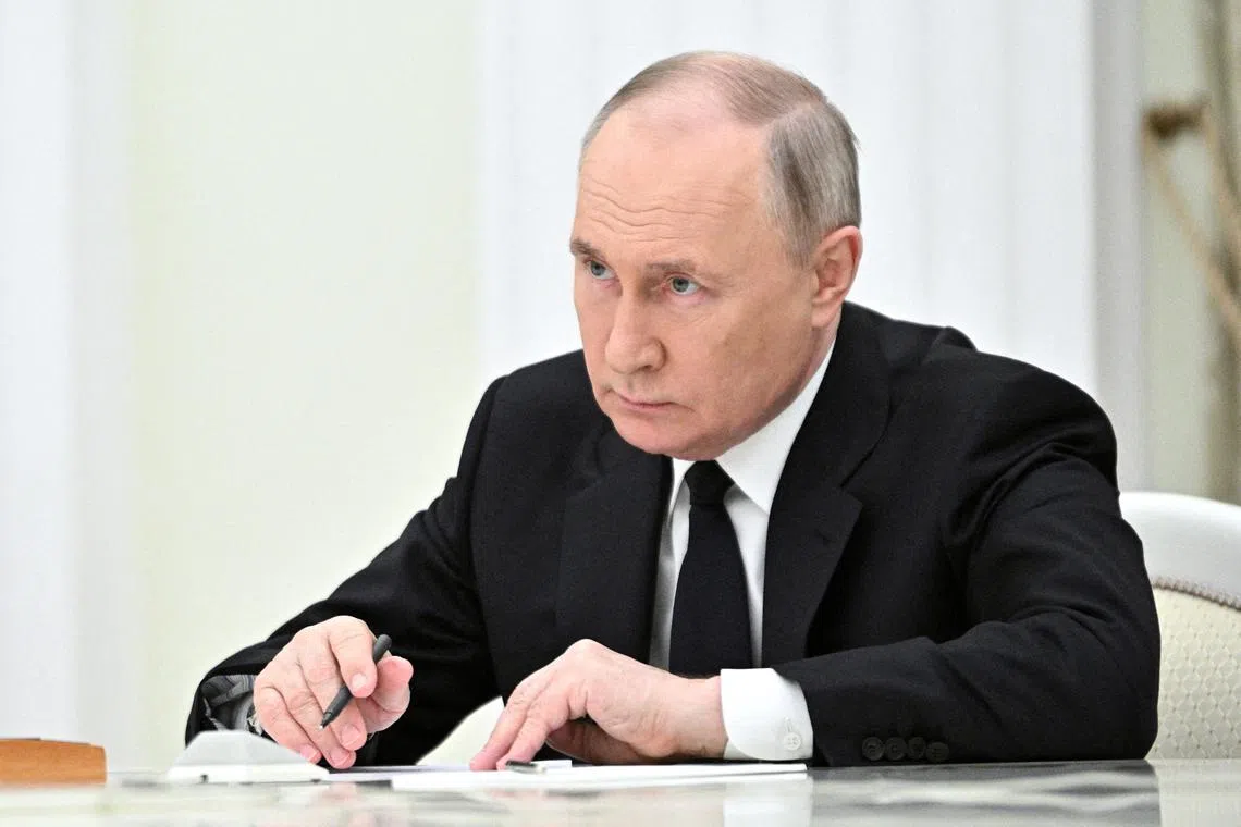 Russian President Vladimir Putin said that four detained “perpetrators” were “travelling towards Ukraine.