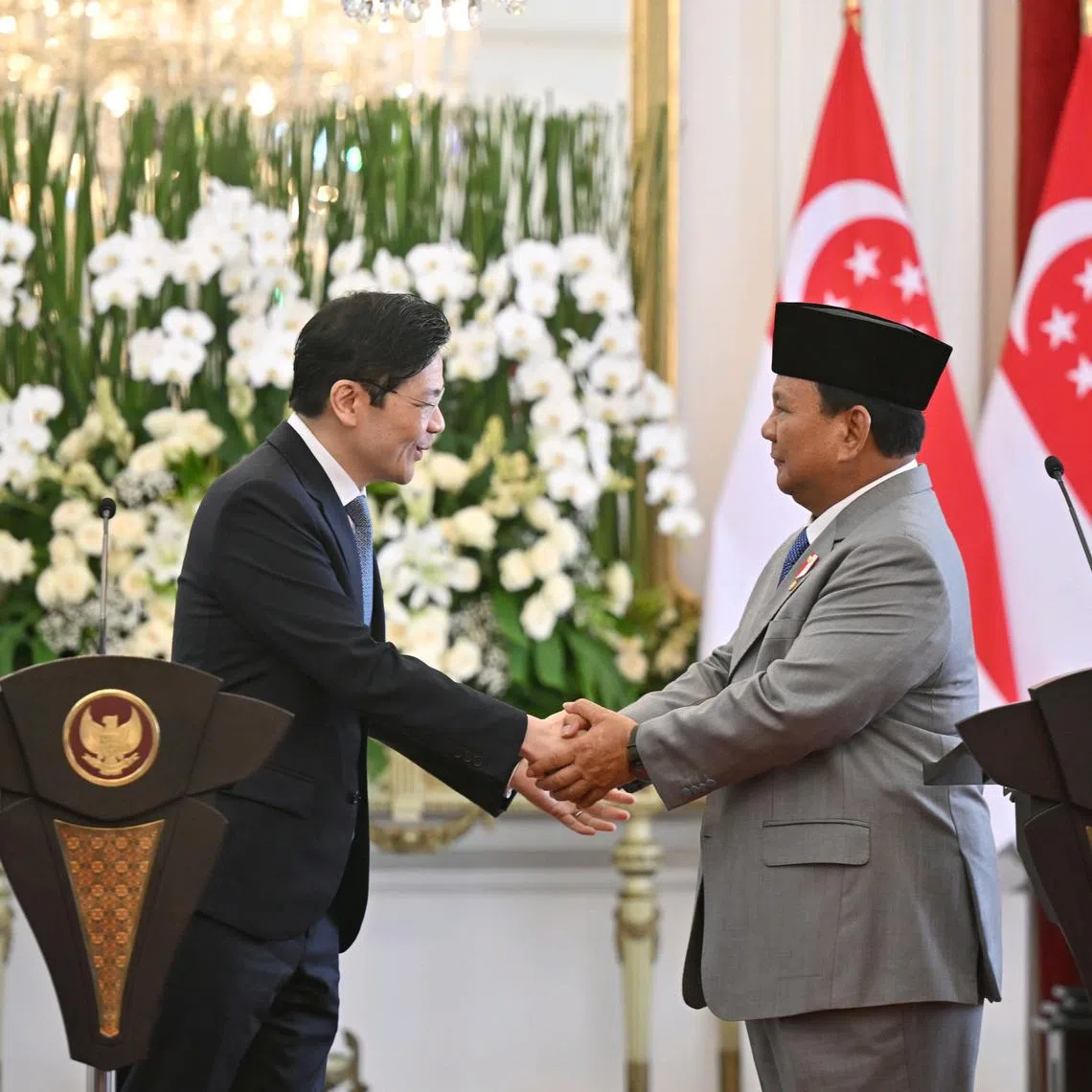 PM Lawrence Wong and Indonesian President Prabowo Subianto at a joint press conference at the presidential palace in Jakarta on Nov 6.