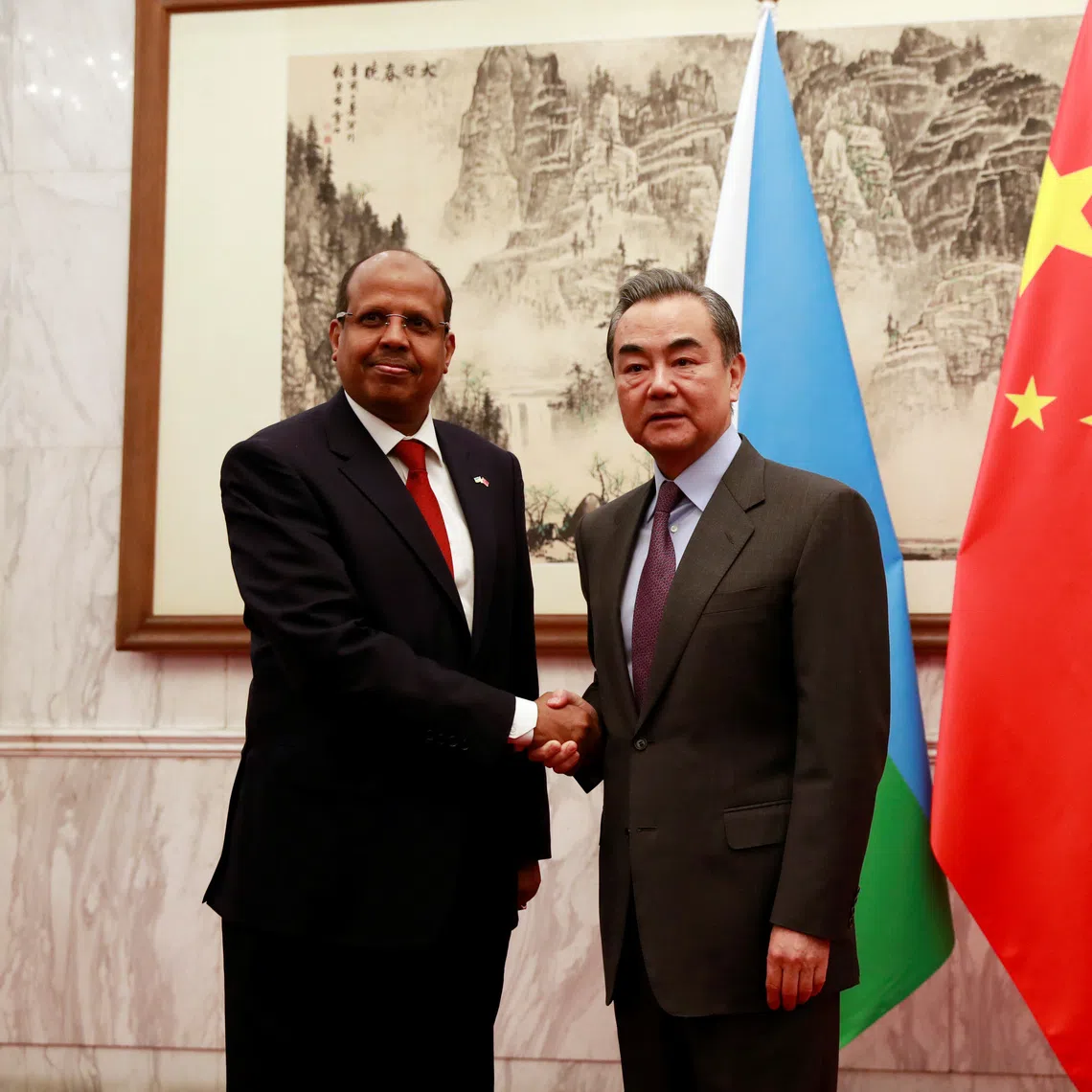 Djibouti’s former Foreign Minister Mahamoud Ali Youssouf (left) with his Chinese counterpart Wang Yi during their meeting in 2019.