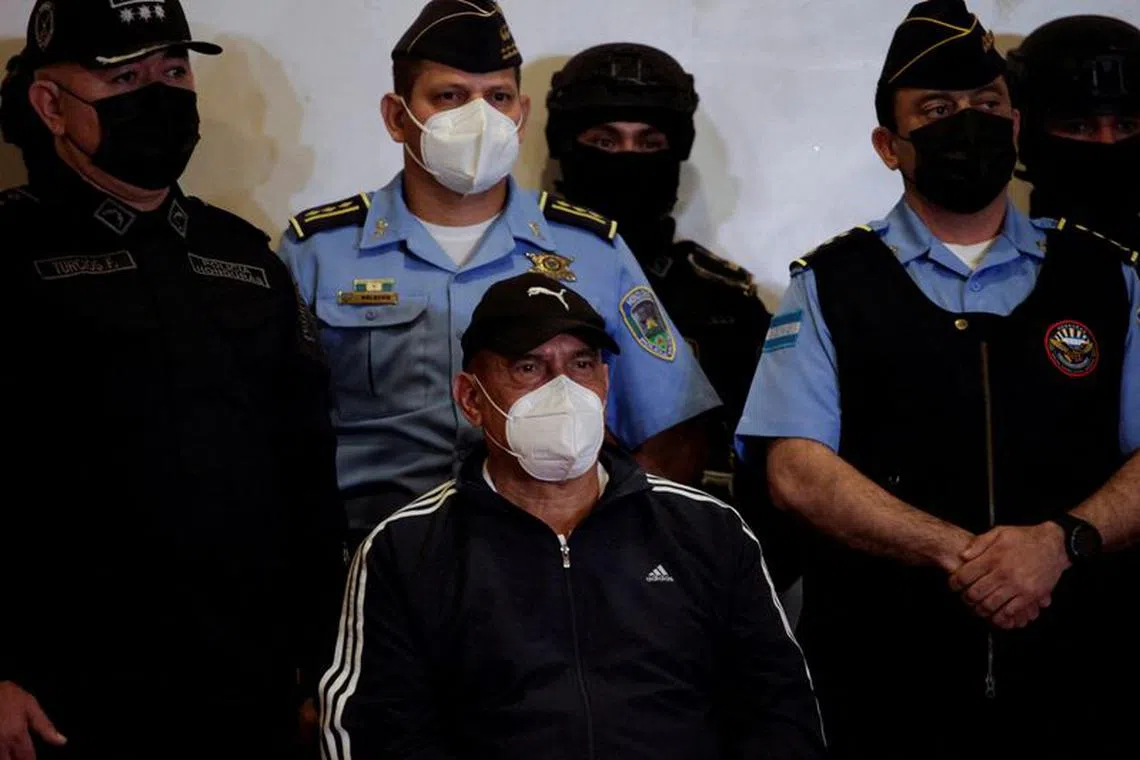 FILE PHOTO: Former police chief Juan Carlos \"El Tigre\" Bonilla, wanted by the United States on drug-trafficking charges, is presented to the media at a police base following his detention after being on the run for several months, in Tegucigalpa, Honduras March 9, 2022. REUTERS/Fredy Rodriguez/File Photo