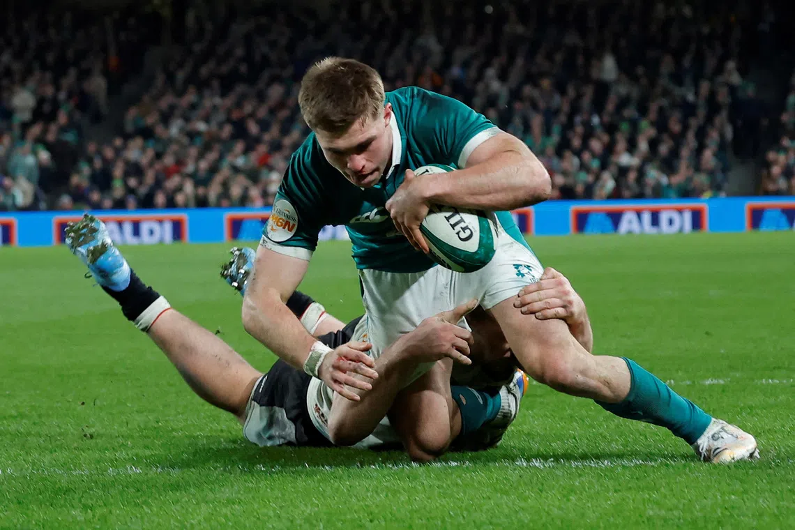 FILE PHOTO: Rugby Union - Six Nations Championship - Ireland v Wales - Aviva Stadium, Dublin, Ireland - March 6, 2026 Ireland's Jack Crowley scores their second try REUTERS/Clodagh Kilcoyne/File Photo