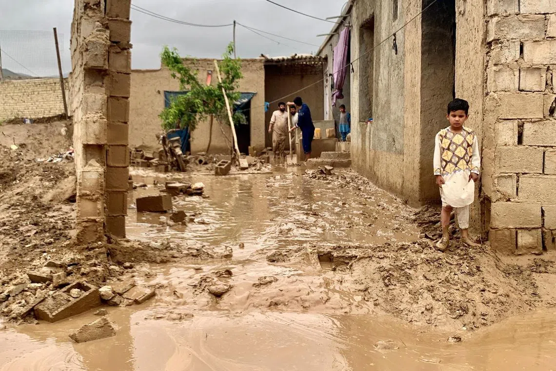 Flash floods killed hundreds of people in Afghanistan in May (above) and swamped agricultural lands in the country.