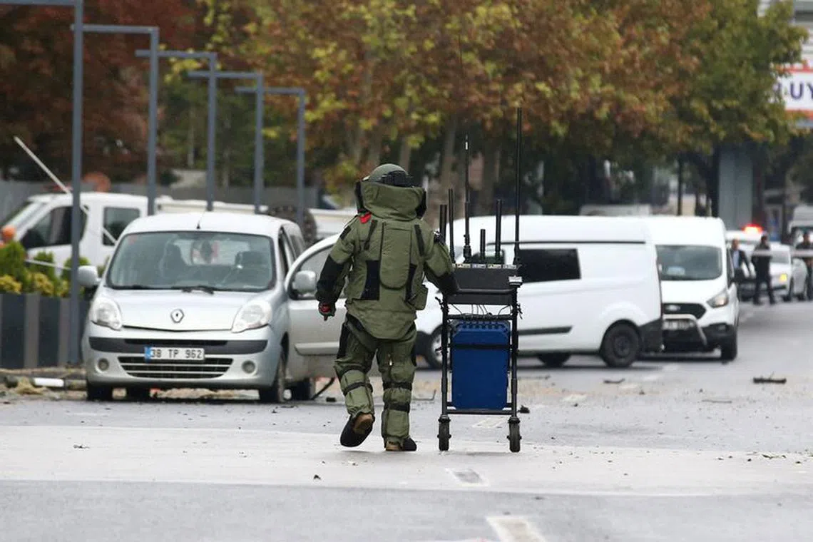 FILE PHOTO: A bomb disposal expert works at the scene after a bomb attack in Ankara, Turkey October 1, 2023. REUTERS/Cagla Gurdogan/File Photo