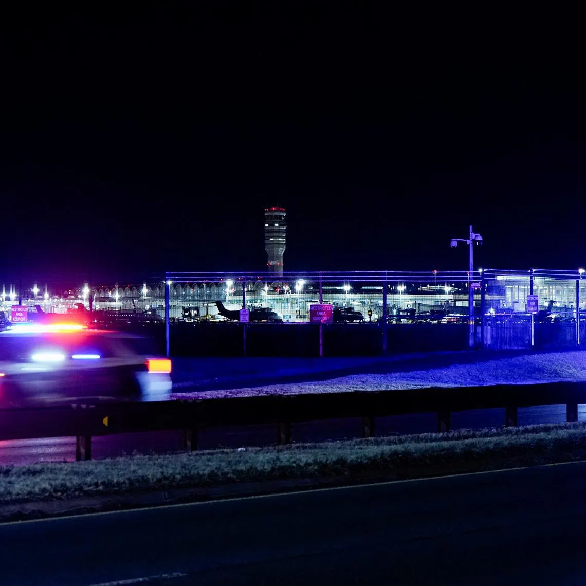 A view shows Reagan Washington National Airport, as seen from Arlington, after American Eagle flight 5342 collided with a helicopter while approaching Reagan Washington National Airport and crashed in the Potomac River, Virginia, U.S. January 29, 2025. REUTERS/Elizabeth Frantz