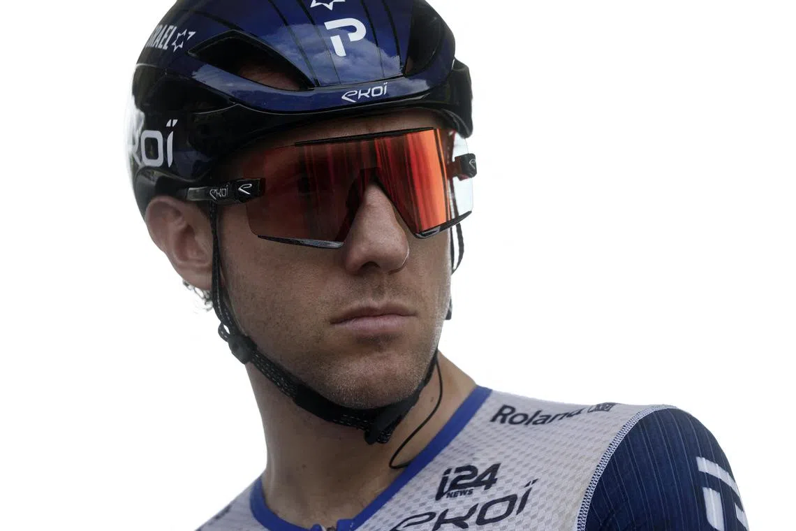 Canada's Michael Woods won stage 9 of the Tour de France to the Puy de Dome from a breakaway that went from the gun.