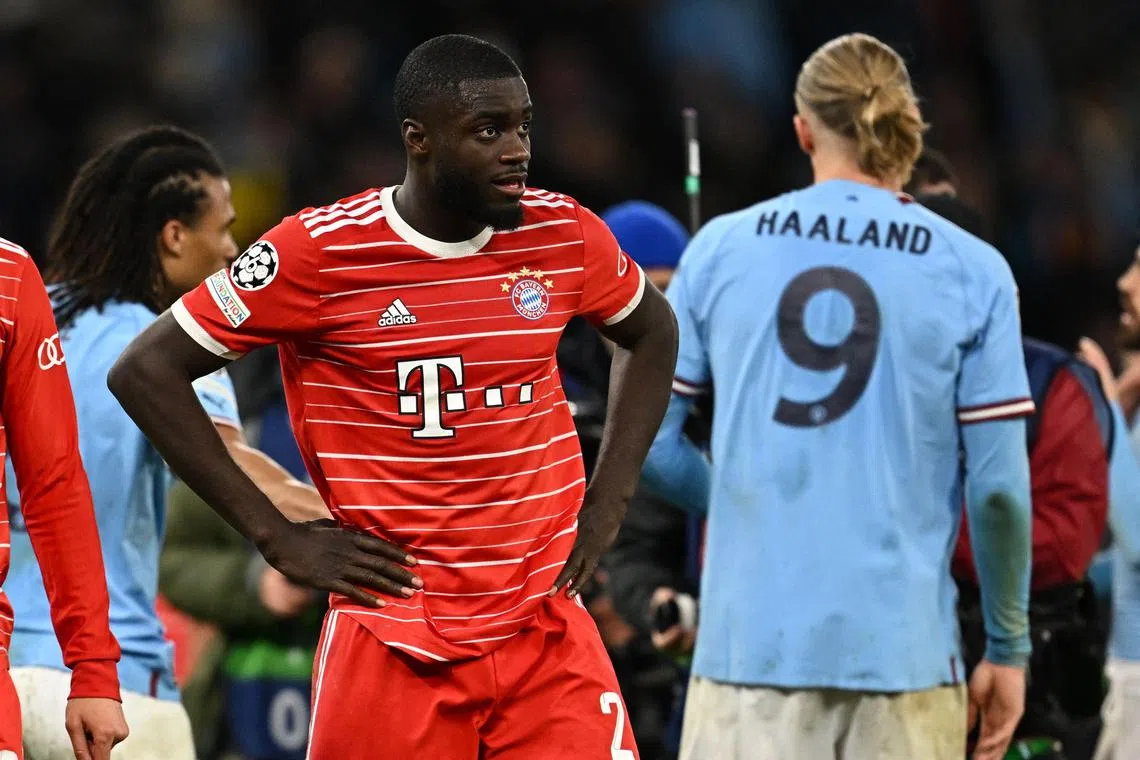 Bayern Munich's French defender Dayot Upamecano reacts to their defeat against Manchester City.
