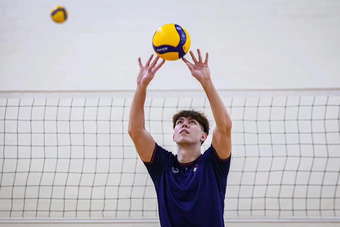 National volleyball player Jordan Wong, 23, training with his teammates at OCBC Arena on Oct 13, ahead of his stint in the Vietnam Volleyball League. ST PHOTO: BRIAN TEO