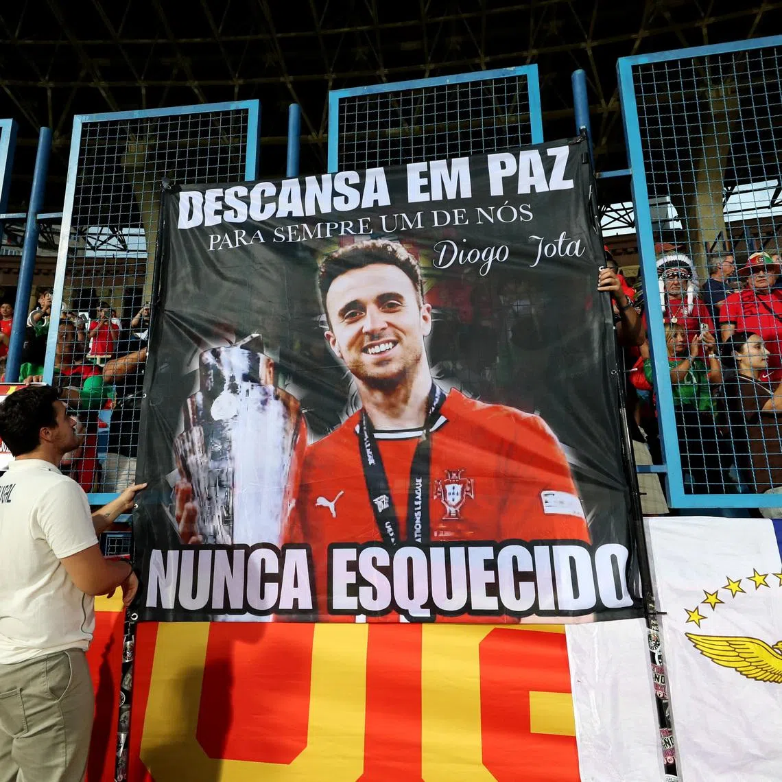 Soccer Football - World Cup - UEFA Qualifiers - Group F - Armenia v Portugal - Vazgen Sargsyan Republican Stadium, Yerevan, Armenia - September 6, 2025 Portugal fans display a banner in memory of Diogo Jota inside the stadium before the match Photolure via REUTERS/Hayk Baghdasaryan