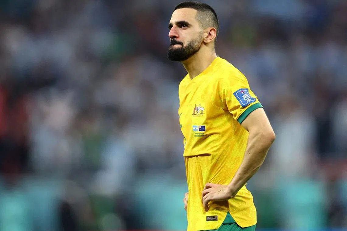FILE PHOTO: Soccer Football - FIFA World Cup Qatar 2022 - Round of 16 - Argentina v Australia - Ahmad bin Ali Stadium, Al Rayyan, Qatar - December 4, 2022  Australia's Aziz Behich looks dejected after the match as Australia are eliminated from the World Cup REUTERS/Carl Recine/File Photo
