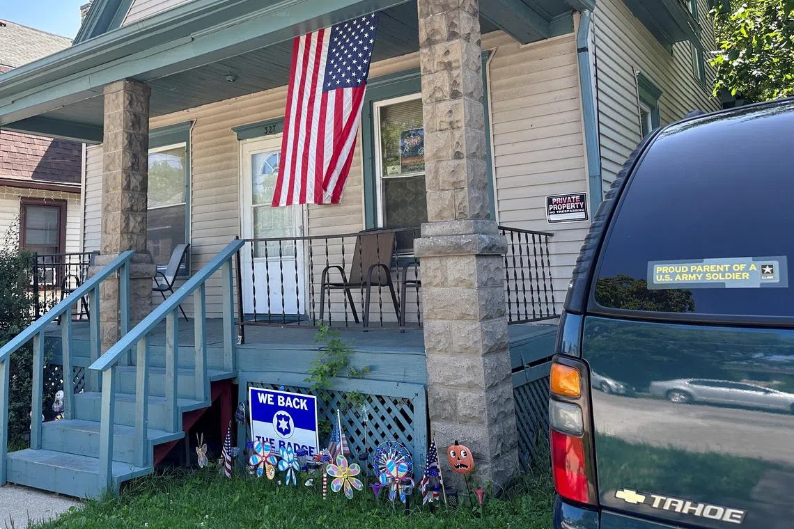 A US flag hangs on the porch of the home of US Army Private Travis King in Racine, Wisconsin.
