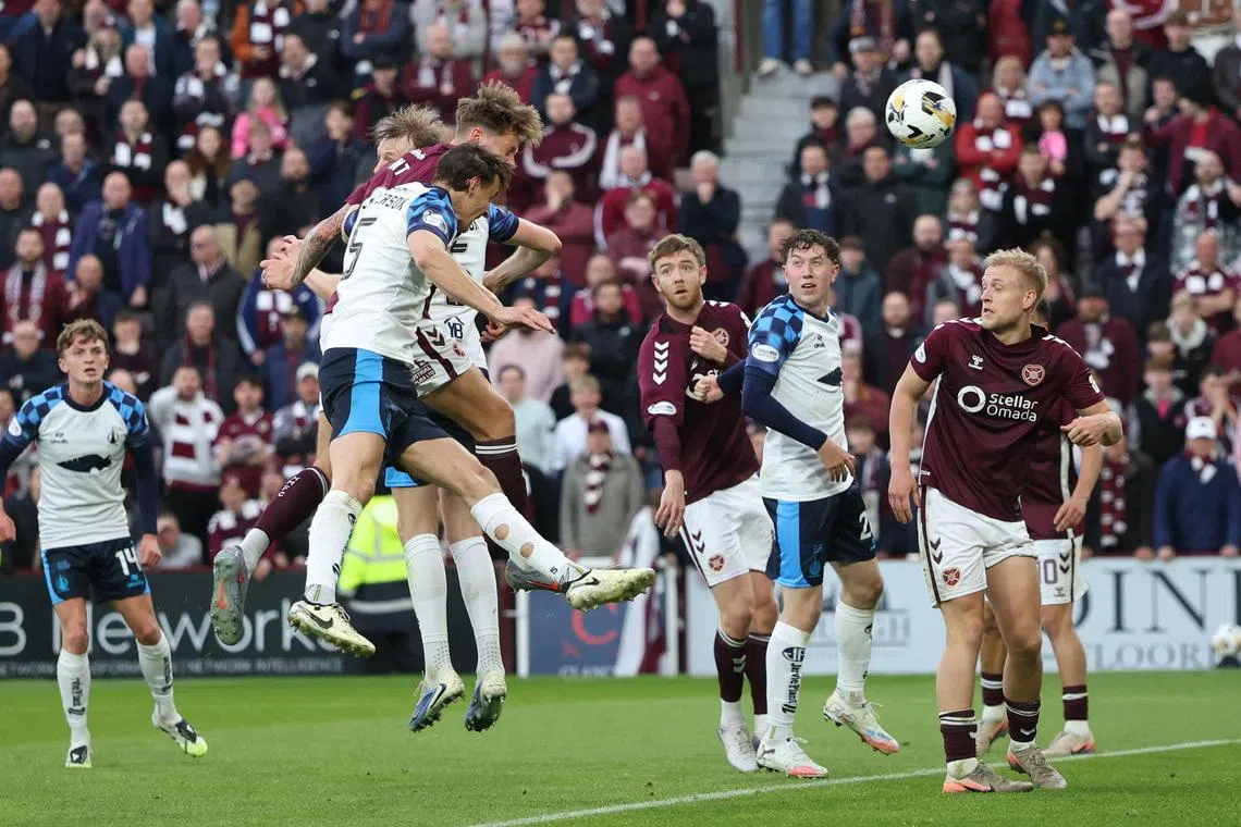 Soccer Football - Scottish Premiership - Heart of Midlothian v Falkirk - Tynecastle Park, Edinburgh, Scotland, Britain - May 13, 2026 Heart of Midlothian's Frankie Kent scores their first goal REUTERS/Russell Cheyne