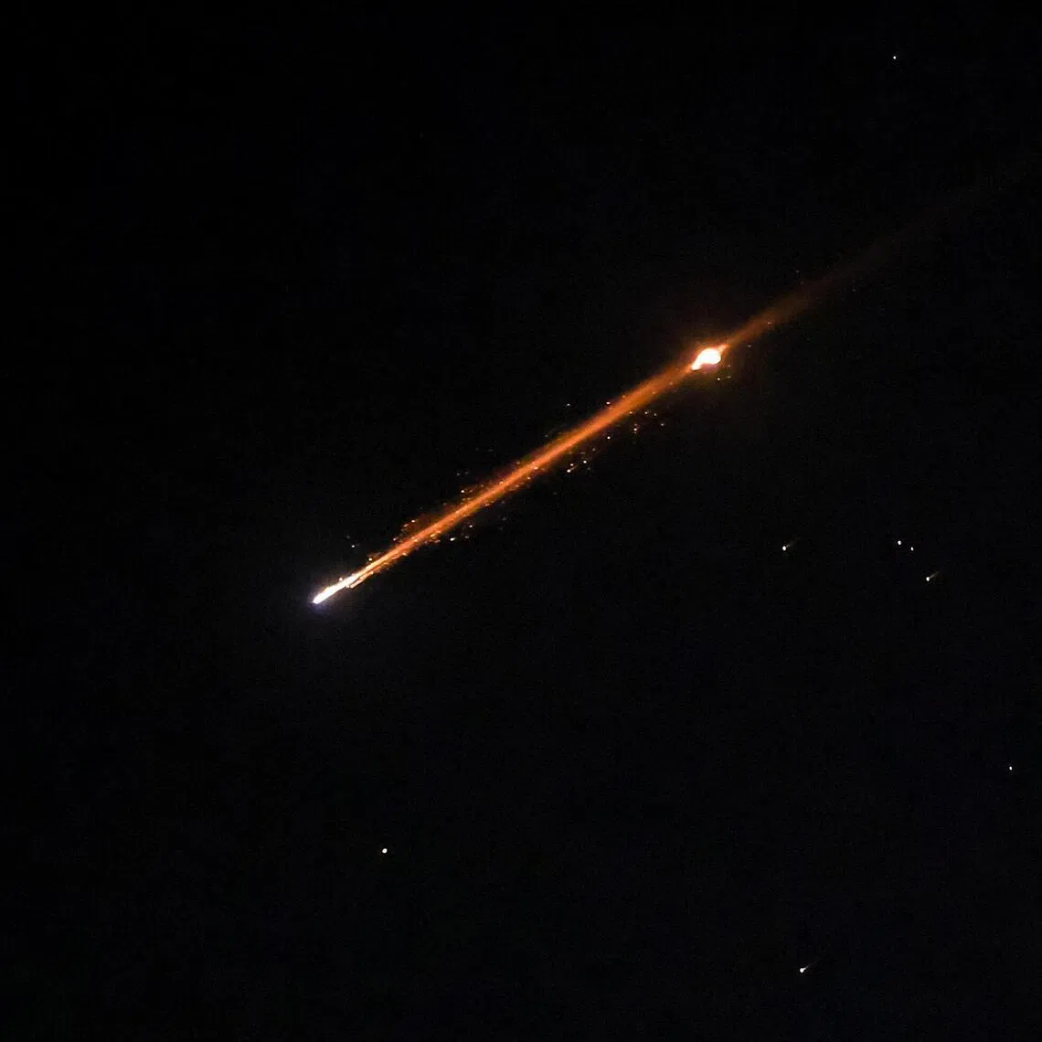 An Iranian missile with cluster munitions flies over Jerusalem, amid the US-Israeli conflict with Iran, on March 20.