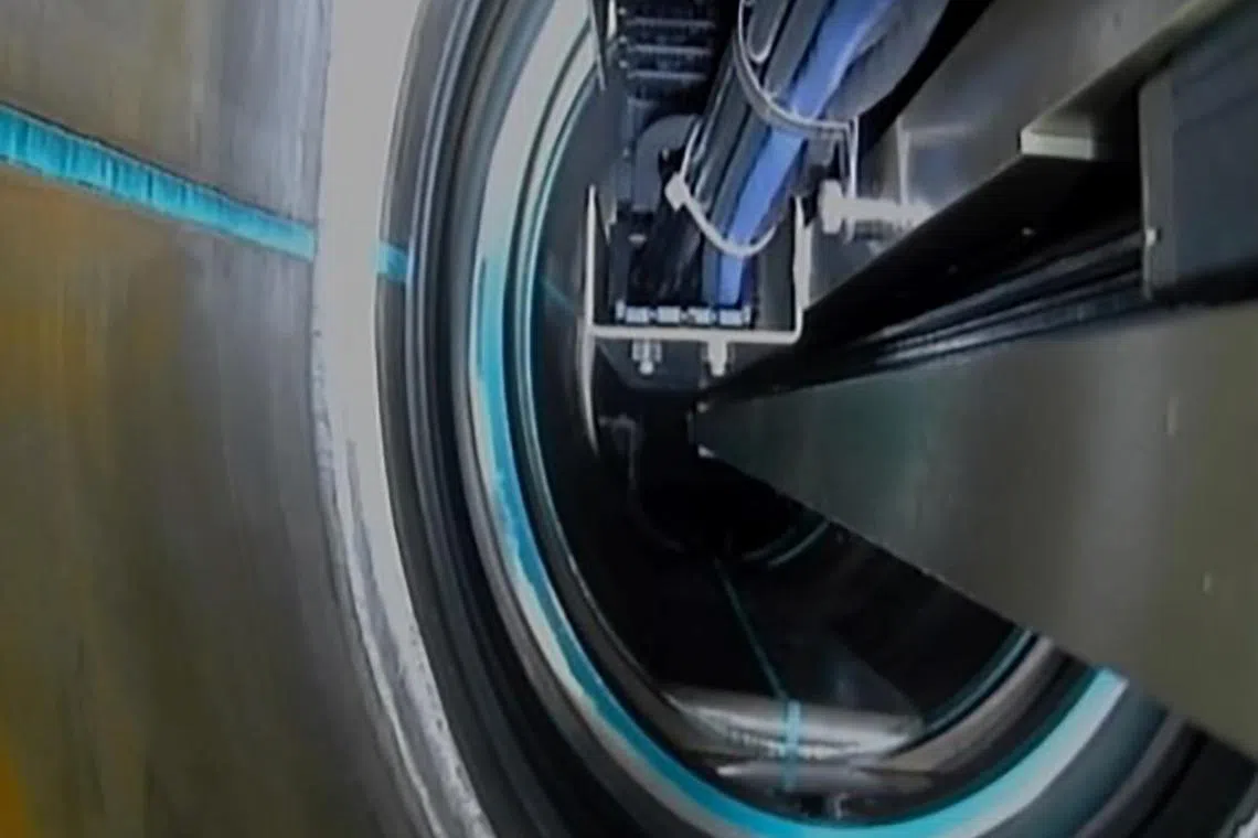 A cable passing through an isolation valve as part of an operation to extract melted nuclear debris at the remote operation room of tsunami-crippled Tepco's Fukushima Daiichi Nuclear Power Plant in Okuma, Fukushima Prefecture, on Sept 10, 2024. 