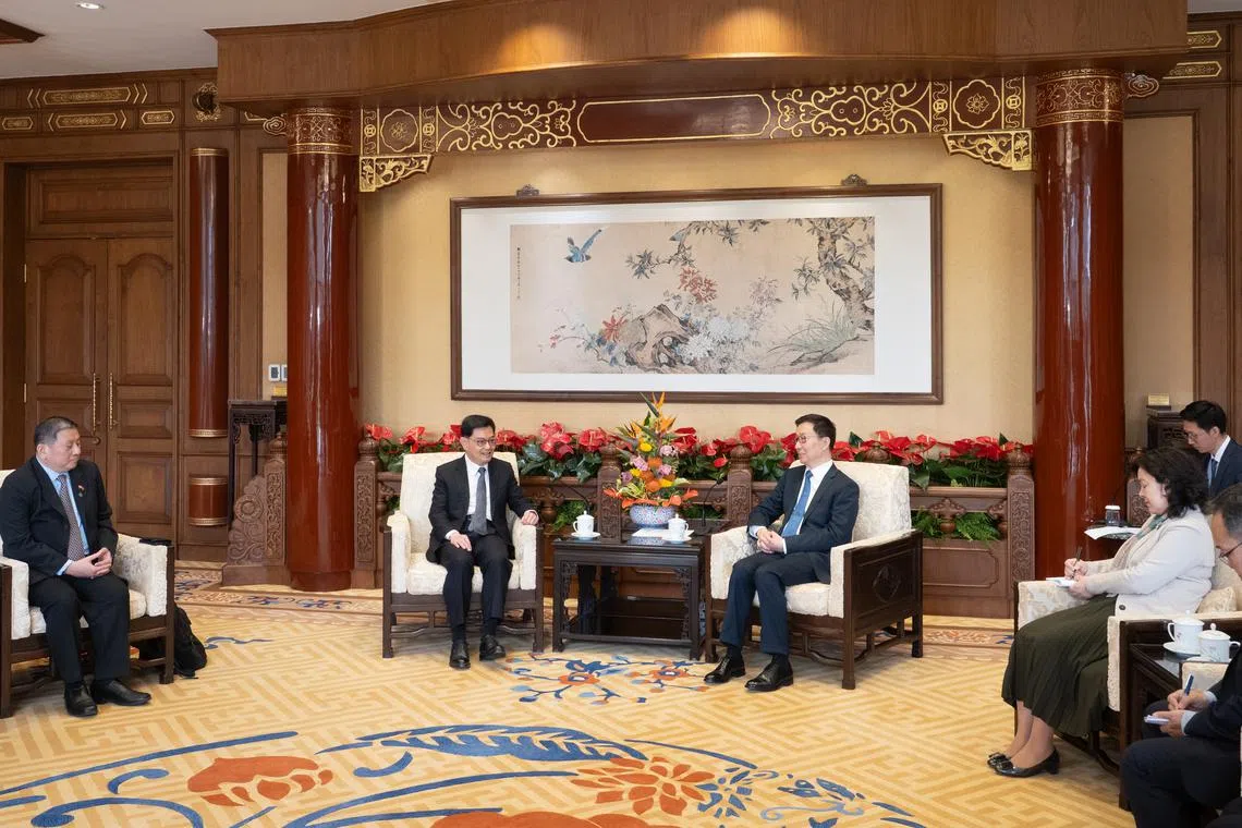 DPM Heng Swee Keat meets China's Vice President Han Zheng in Beijing on March 26.
