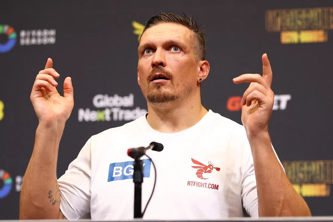 Boxing - Oleksandr Usyk v Daniel Dubois - Undisputed World Heavyweight Title - BoxPark Wembley, London, Britain - July 19, 2025 Oleksandr Usyk during the press conference after winning the fight against Daniel Dubois Action Images via Reuters/Andrew Boyers