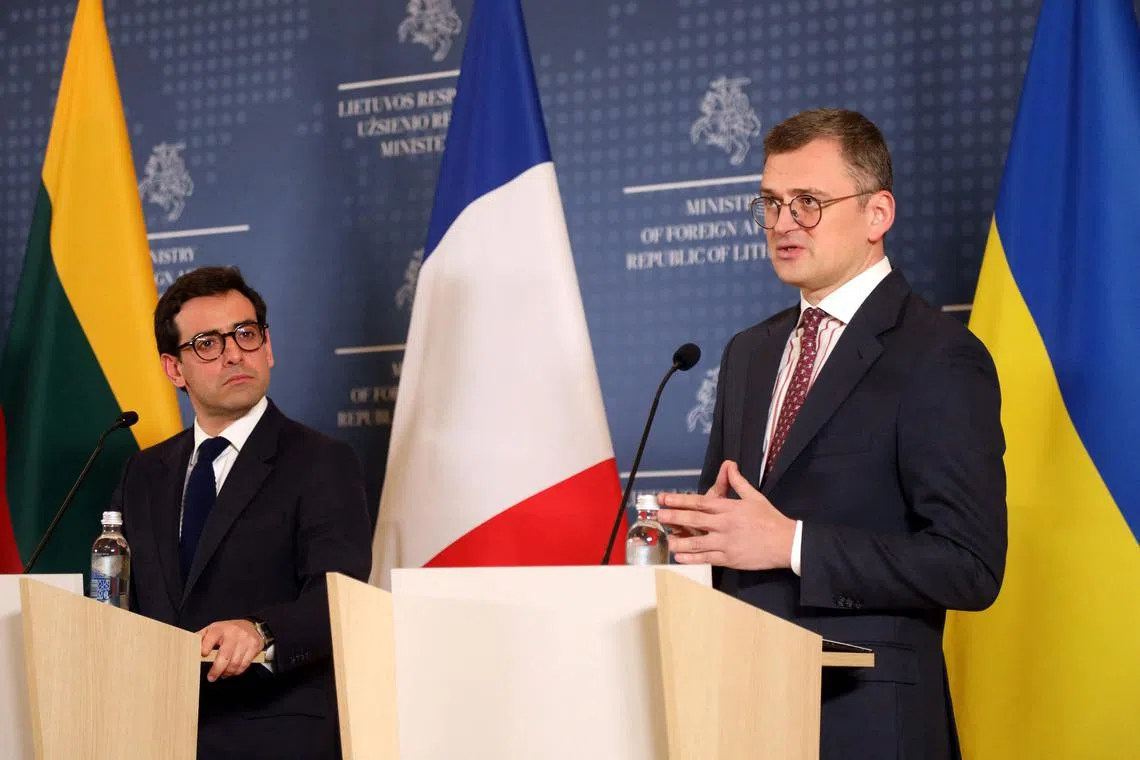 French Minister for Foreign and European Affairs Stephane Sejourne listens as Ukrainian Foreign Minister Dmytro in Vilnius, Lithuania.