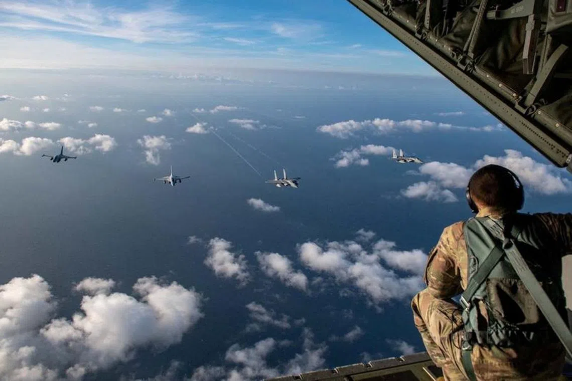 Aircraft of the Philippine Air Force and the U.S. Indo-Pacific Command participate in the joint Philippines-U.S. Maritime Cooperative Activity in the vicinity of Batanes and an area of the South China Sea that falls within the exclusive economic zone of the Philippines, November 21, 2023. Philippine Air Force/Handout via REUTERS THIS IMAGE HAS BEEN SUPPLIED BY A THIRD PARTY NO RESALES. NO ARCHIVES