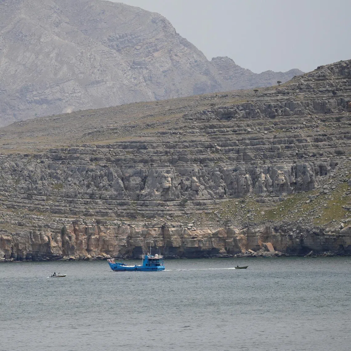 Ships and boats in the Strait of Hormuz, Musandam, Oman, April 22, 2026. REUTERS/Stringer