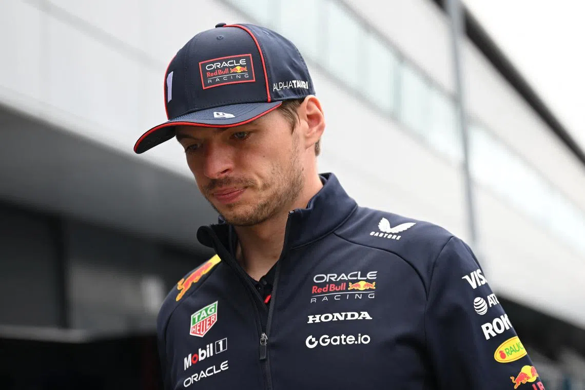 FILE PHOTO: Formula One F1 - British Grand Prix - Silverstone Circuit, Silverstone, Britain - July 6, 2025 Red Bull's Max Verstappen arrives ahead of the race REUTERS/Jaimi Joy/File Photo