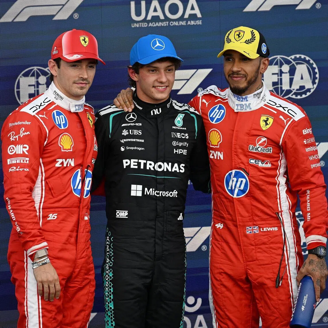 epa13086462 (L-R) Second-placed Scuderia Ferrari driver Charles Leclerc of Monaco, first-placed Mercedes driver Andrea Kimi Antonelli of Italy, and third-placed Scuderia Ferrari driver Lewis Hamilton of Britain pose for a photo after the Qualifying for the Formula One British Grand Prix at the Silverstone Circuit racetrack in Silverstone, Britain, 04 July 2026. The 2026 Formula 1 British Grand Prix is held on 05 July.  EPA/PETER POWELL .