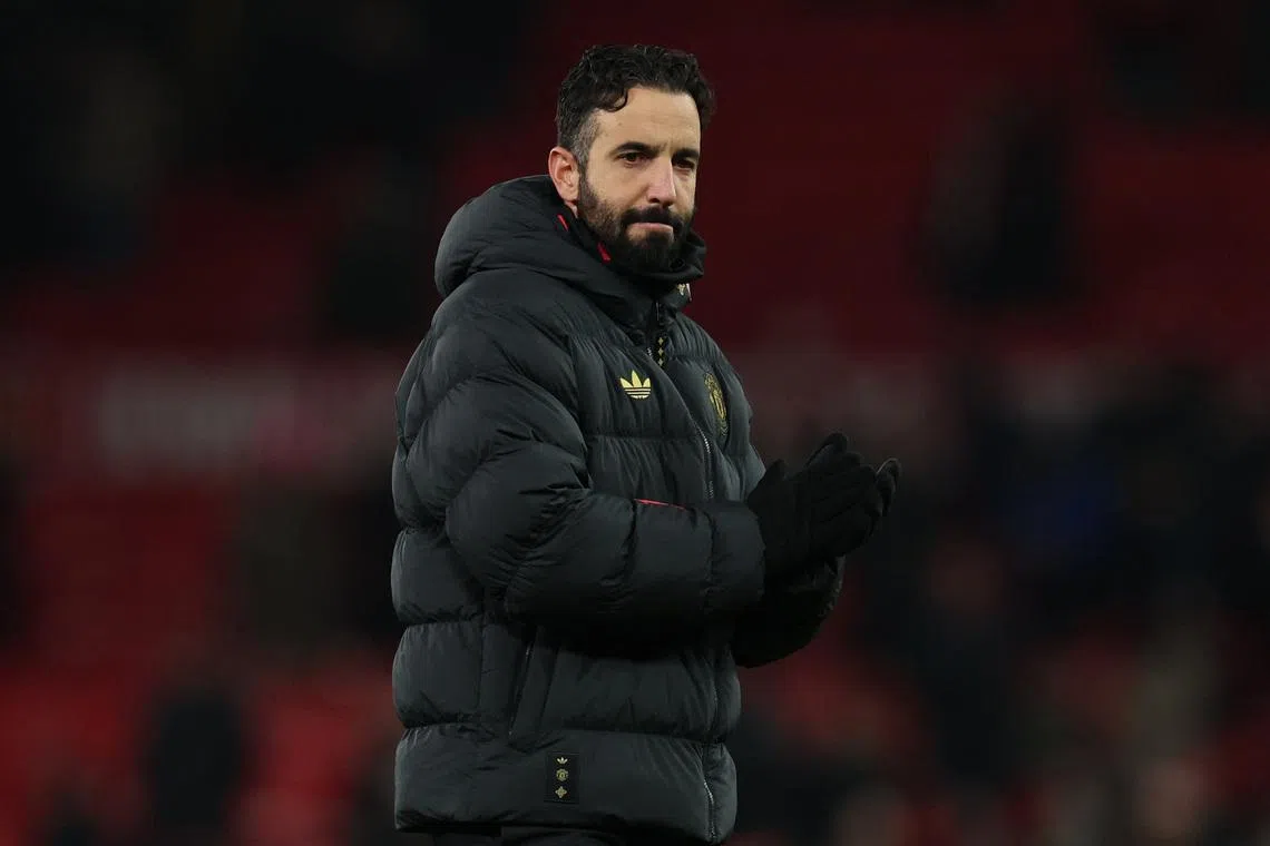 Soccer Football - Premier League - Manchester United v Wolverhampton Wanderers - Old Trafford, Manchester, Britain - December 30, 2025 Manchester United manager Ruben Amorim applauds fans after the match REUTERS/Phil Noble